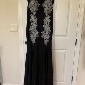 Jovani black gown size 6,new with tags.